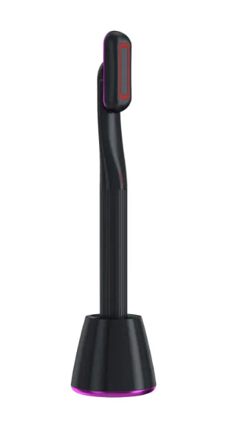 A black and pink 360° Rotary Eye & Face Massager with a rotating head and red LED light