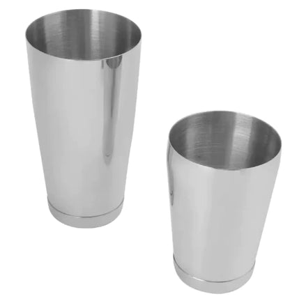 Two stainless steel cups on a white background