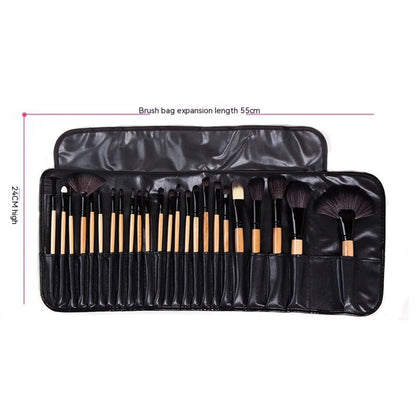 A set of 24 professional makeup brushes with black handles, displayed in an open case.