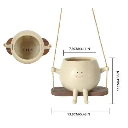 Swing Face Planter Pot erfect for displaying your favorite plants or flowers, this pot is a versatile addition to any room in your home. The swing design adds an element of playful elegance, My Store