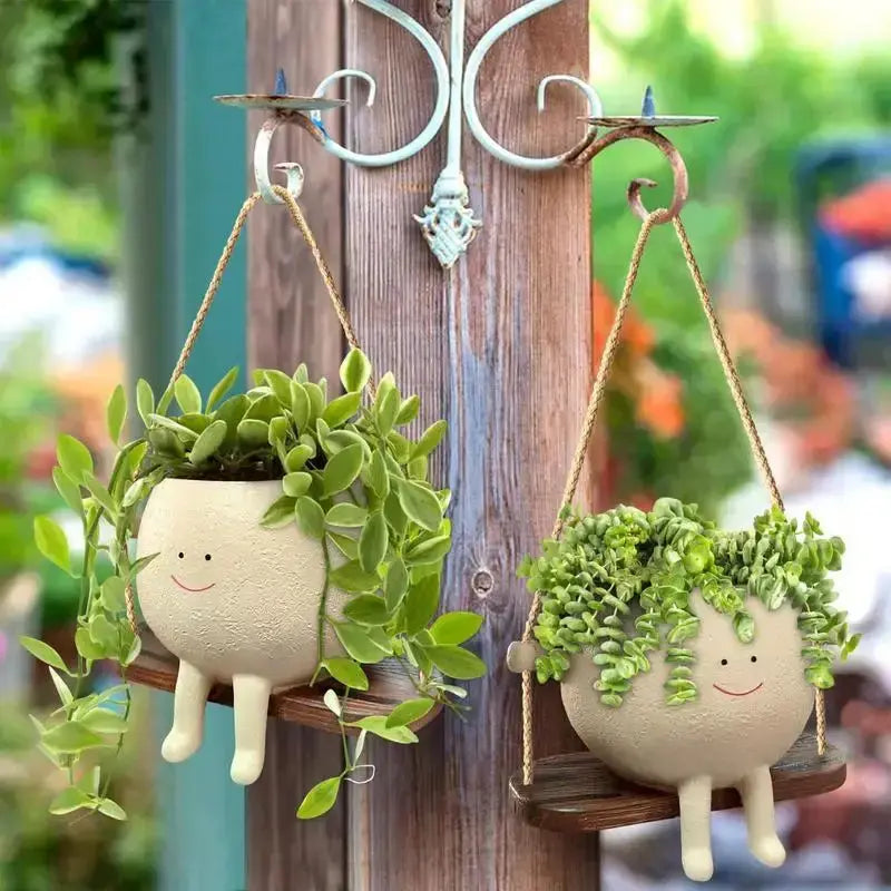 Swing Face Planter Pot erfect for displaying your favorite plants or flowers, this pot is a versatile addition to any room in your home. The swing design adds an element of playful elegance, My Store