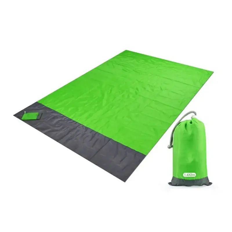 Waterproof Beach Blanket Pocket  The lightweight design makes it ideal for travel, picnics, camping, and more. Whether you're soaking up the sun or enjoying a picnic in the park, this blanket is a must-have accessory. My Store