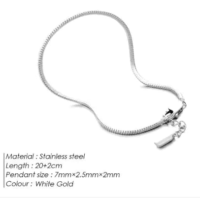 A white gold colored stainless steel octagonal snake bone bracelet with a length of 20 cm, displayed on a white background.